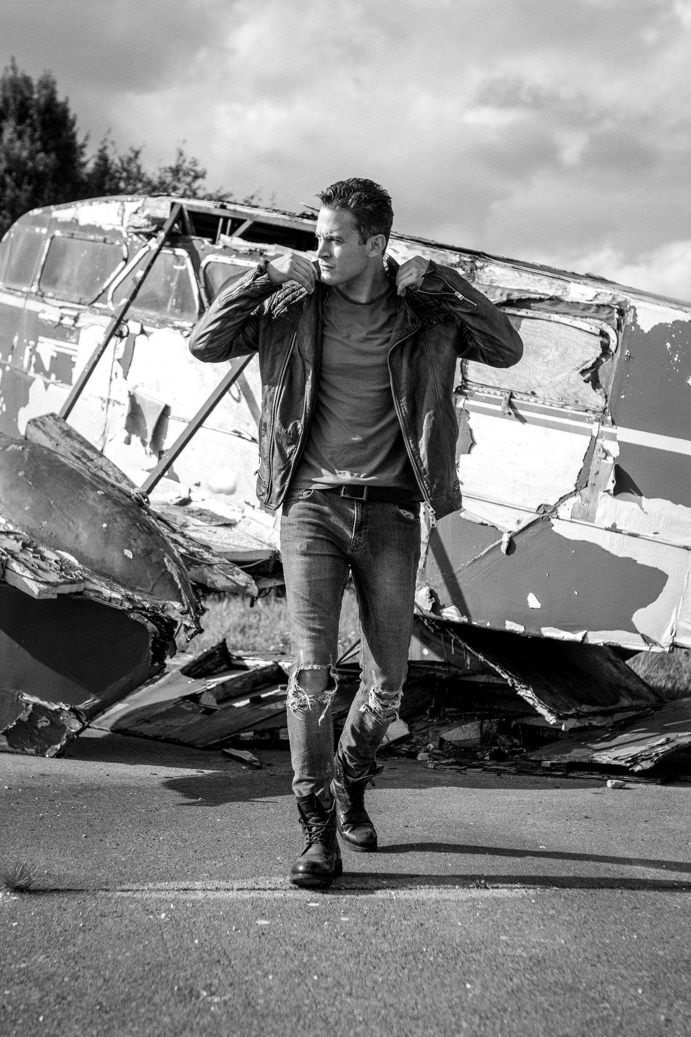 Gary Lucy, editorial portrait, walking toward camera