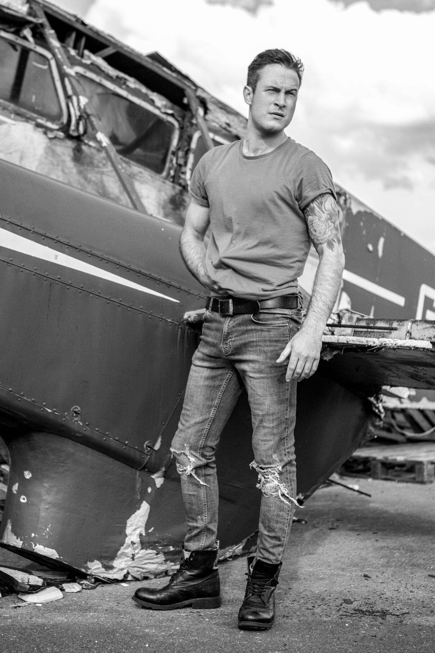 Gary Lucy, full-length black and white editorial portrait